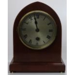 An Edwardian mahogany lancet top mantel clock, sil