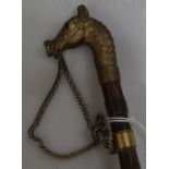 A Victorian umbrella with cast-brass horse head ha