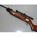 An SMK .22 air rifle with 4 x 20 telescopic sight