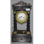 A 19th century French portico clock with inlaid br