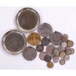 A group of coins and medallions, including Eton Co