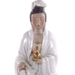 A Chinese porcelain seated Buddha, height 35cm