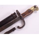 A French 19th century bayonet with metal scabbard,