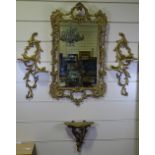 An ornate gilt-metal framed wall mirror, height 10