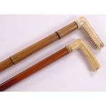 2 19th century carved ivory-handled walking canes