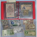 An album of Vintage world banknotes