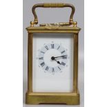 A brass carriage clock marked Hards