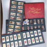 4 albums of Vintage cigarette cards etc