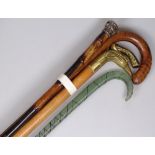 A Nailsea glass walking cane, 2 brass-handled walk