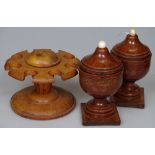 A pair of 19th century fruitwood urn-shaped pots,