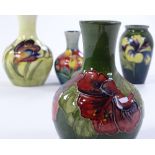 4 Moorcroft floral decorated vases, largest height