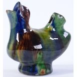 A Wealden type slip glazed pottery bird design whi