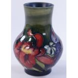 A Moorcroft Orchid design vase, circa 1950, height