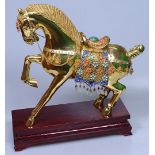 A Chinese gilded silver ornamental horse, with fil