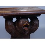 A 19th century Black Forest carved wood stool, sup