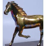 A Chinese gilded silver ornamental horse, on silve