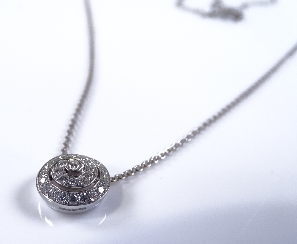 An 18ct white gold diamond swirl pendant, on 18ct - Image 3 of 4