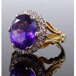 An 18ct gold amethyst and diamond cluster ring, se