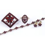 A group of faceted garnet and flat-cut garnet jewe