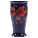 A large Moorcroft Pottery peach and grape design v