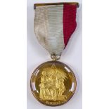 A silver-gilt Masonic medallion, for Charity and B