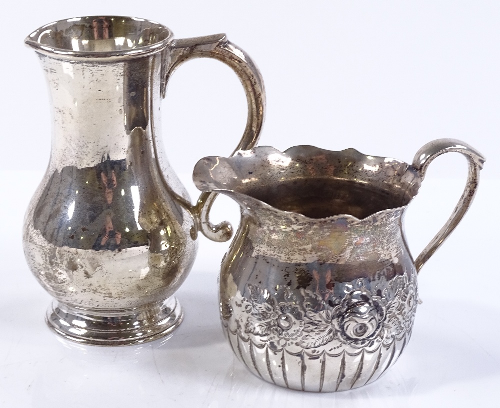 A Victorian silver cream jug, by William Stocker,