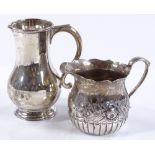 A Victorian silver cream jug, by William Stocker,