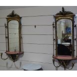 A pair of ornate Victorian gilt gesso-framed pier