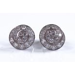 A pair of 18ct white gold diamond swirl earrings,