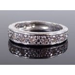 A platinum and diamond three quarter eternity ring