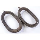 A pair of African patinated metal anklets with rat