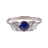 An 18ct white gold 3-stone sapphire and diamond ri