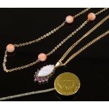 A 9ct gold opal and ruby pendant, a 9ct gold coral