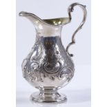 A Victorian silver cream jug, with gilded interior