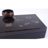 A Japanese lacquer box, with gilded insect designs