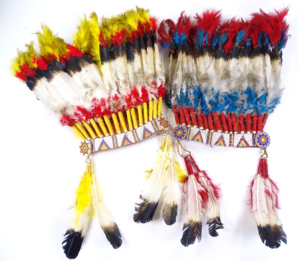 2 Native American Indian feather-mounted head dres