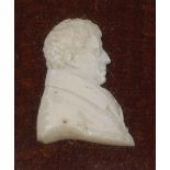 An early 19th century carved ivory cameo portrait