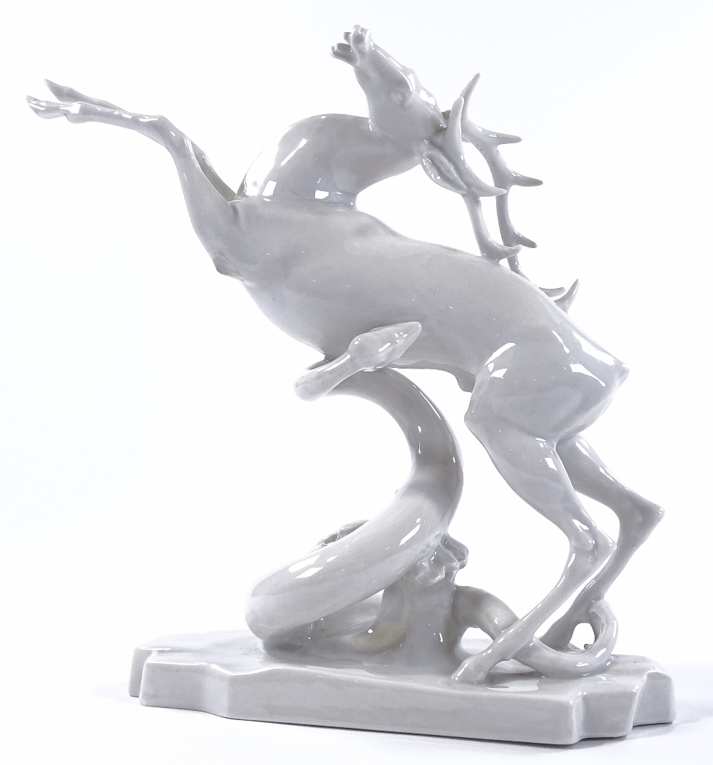 A Herend Blanc de Chine porcelain stag and serpent