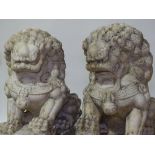 An impressive pair of large scale Chinese carved s
