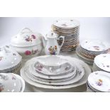 A KPM porcelain dinner service, hand painted butte