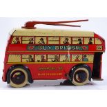 Brimtoy clockwork tinplate trolley bus, "Buy Briti