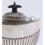 A late Victorian oval silver tea caddy of half flu