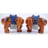 A pair of Chinese porcelain elephants with blue an