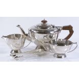 A 3-piece silver tea set, of circular planished fo