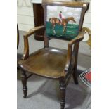 A Victorian oak desk elbow chair, with tapestry up