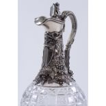 A Victorian cut glass and silver plate claret jug,