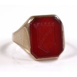 A 9ct gold carnelian seal signet ring, with armori