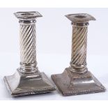 A pair of later Victorian silver dwarf Corinthian