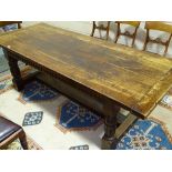 An oak refectory style dining table with 1.75""""