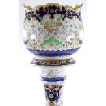 A Continental pottery jardiniere on pedestal, tran